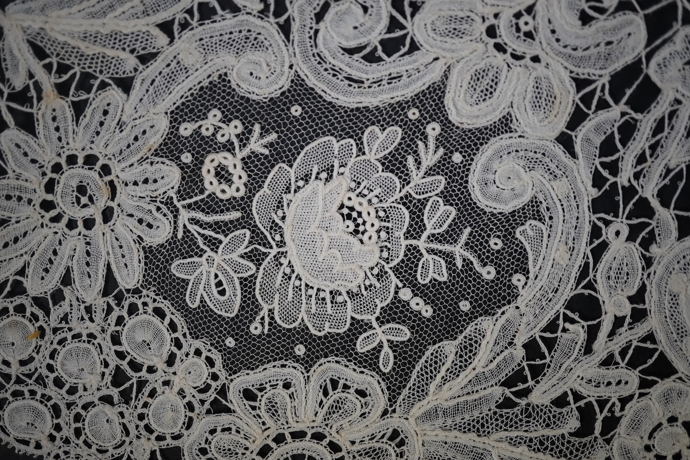 An 1860’s unused, large circular flounce shaped collar of mixed Brussels bobbin lace, with twelve needle lace Point de Gaz insertions, 18.5cm deep, approximately 248cm along bottom, edge. Condition - good